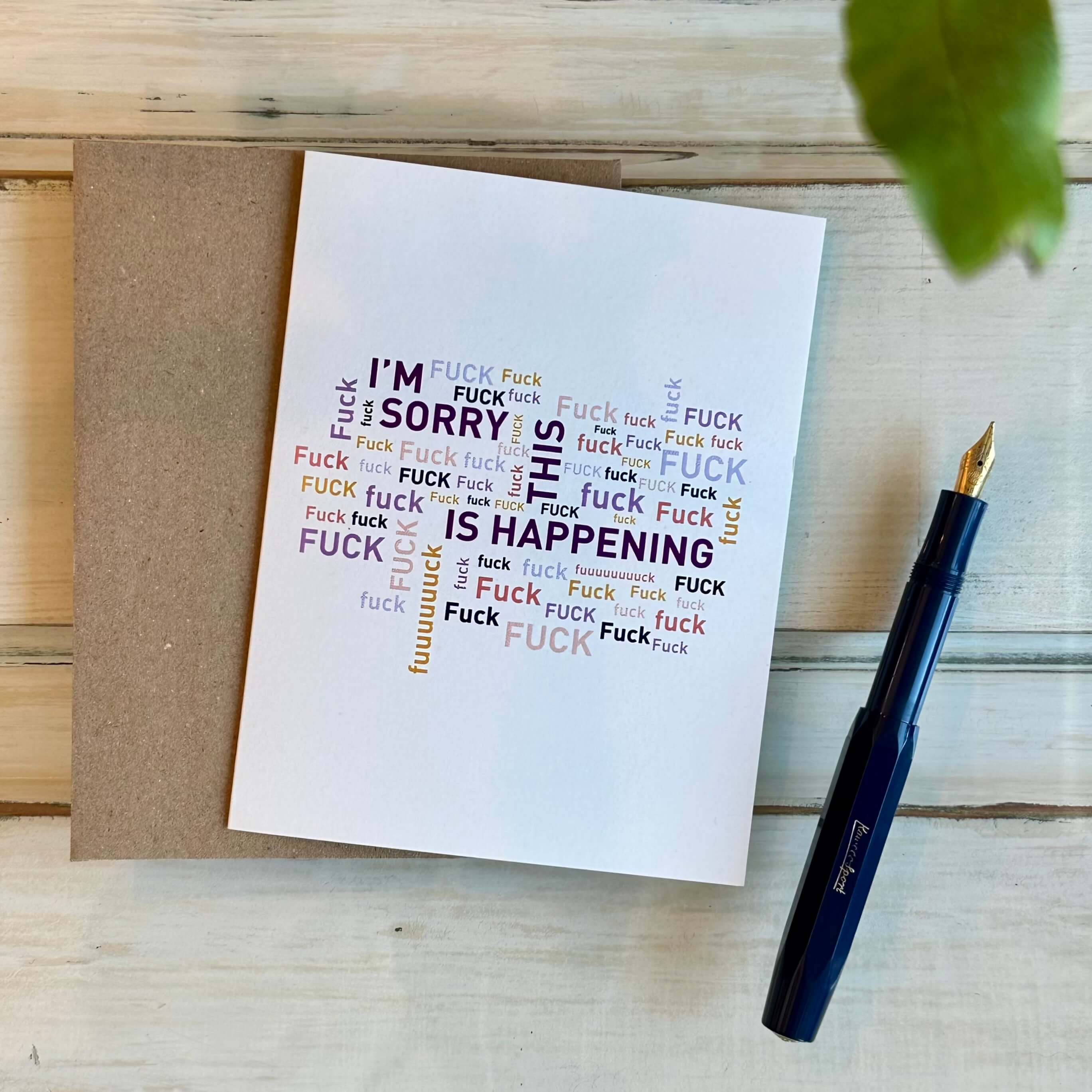 A greeting card with a bold text pattern and the words &