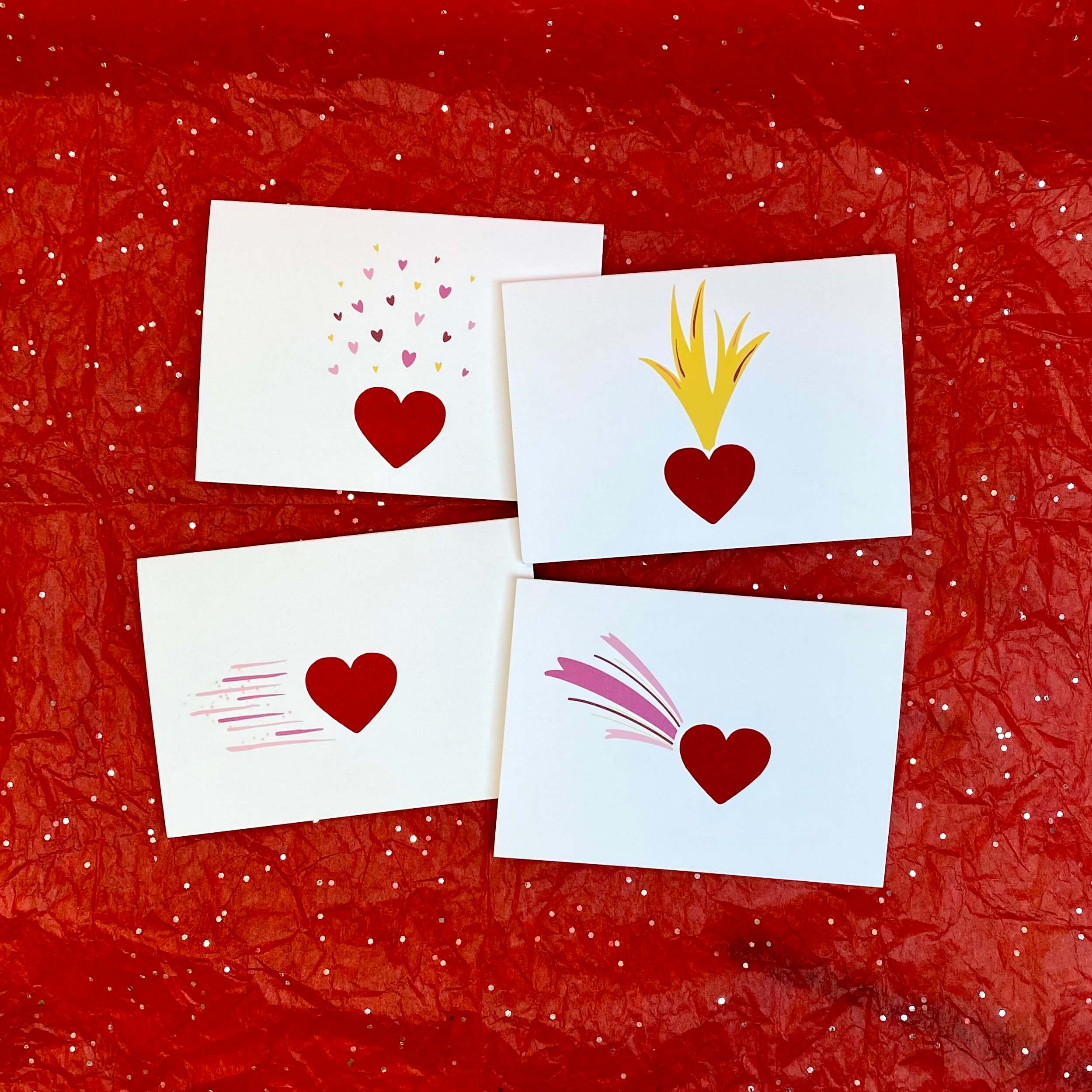 Collection of Valentine cards with a sparkly red heart, each in a different design.