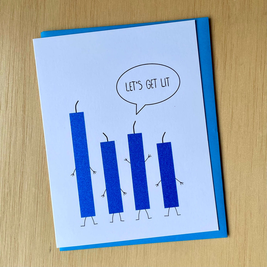 Birthday card with four blue glitter candles and one candle saying, "Let&