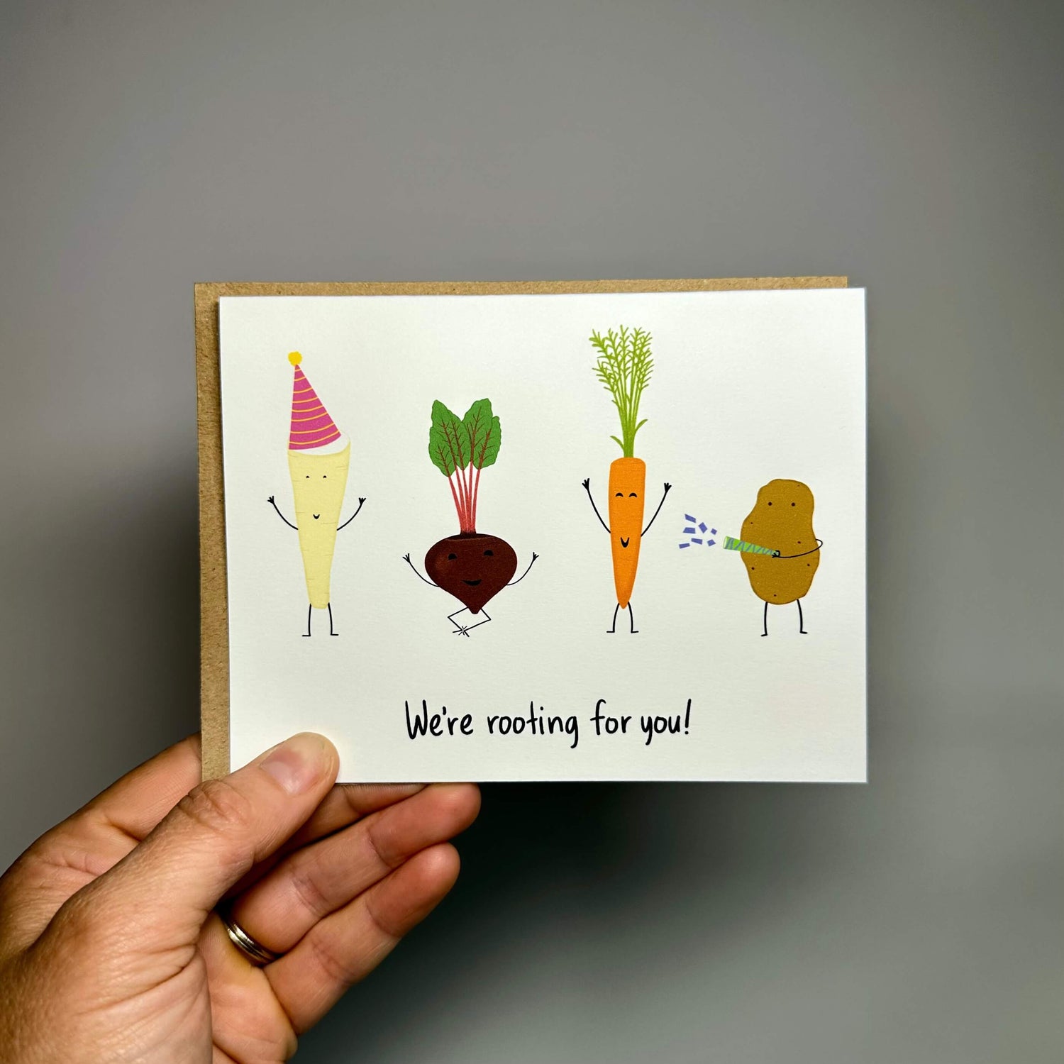 Funny encouragement card with a parsnip, beet, carrot, and potato, and the words, "We&