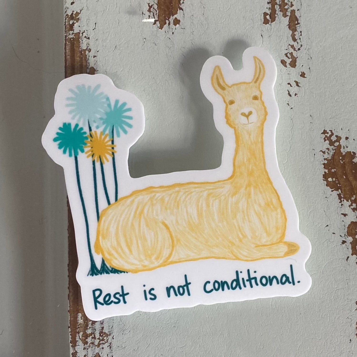 Vinyle sticker with a resting llama, palm trees, and the words, "Rest is not conditional."