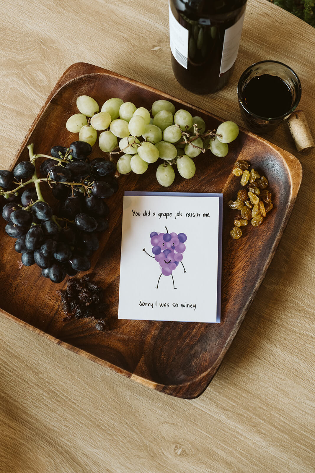 funny card for parents with a bunch of purple grapes and text that says You did a grape job raisin me sorry I was so winey