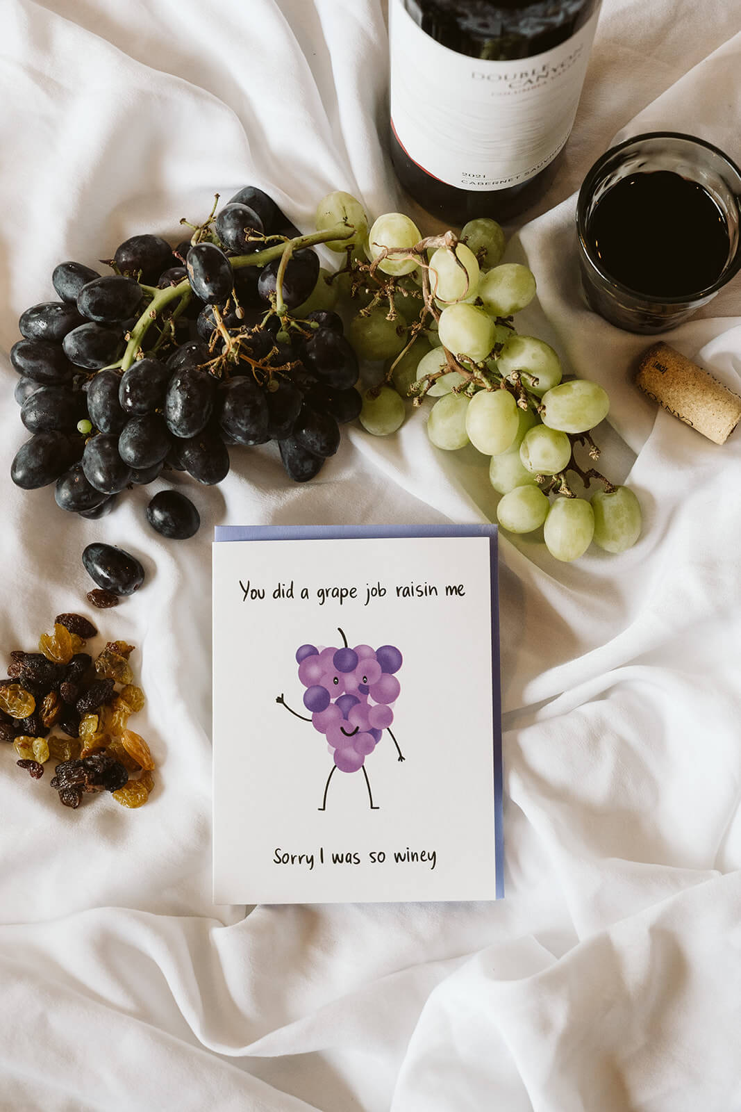 funny mothers day card with a bunch of purple grapes and text that says You did a grape job raisin me sorry I was so winey