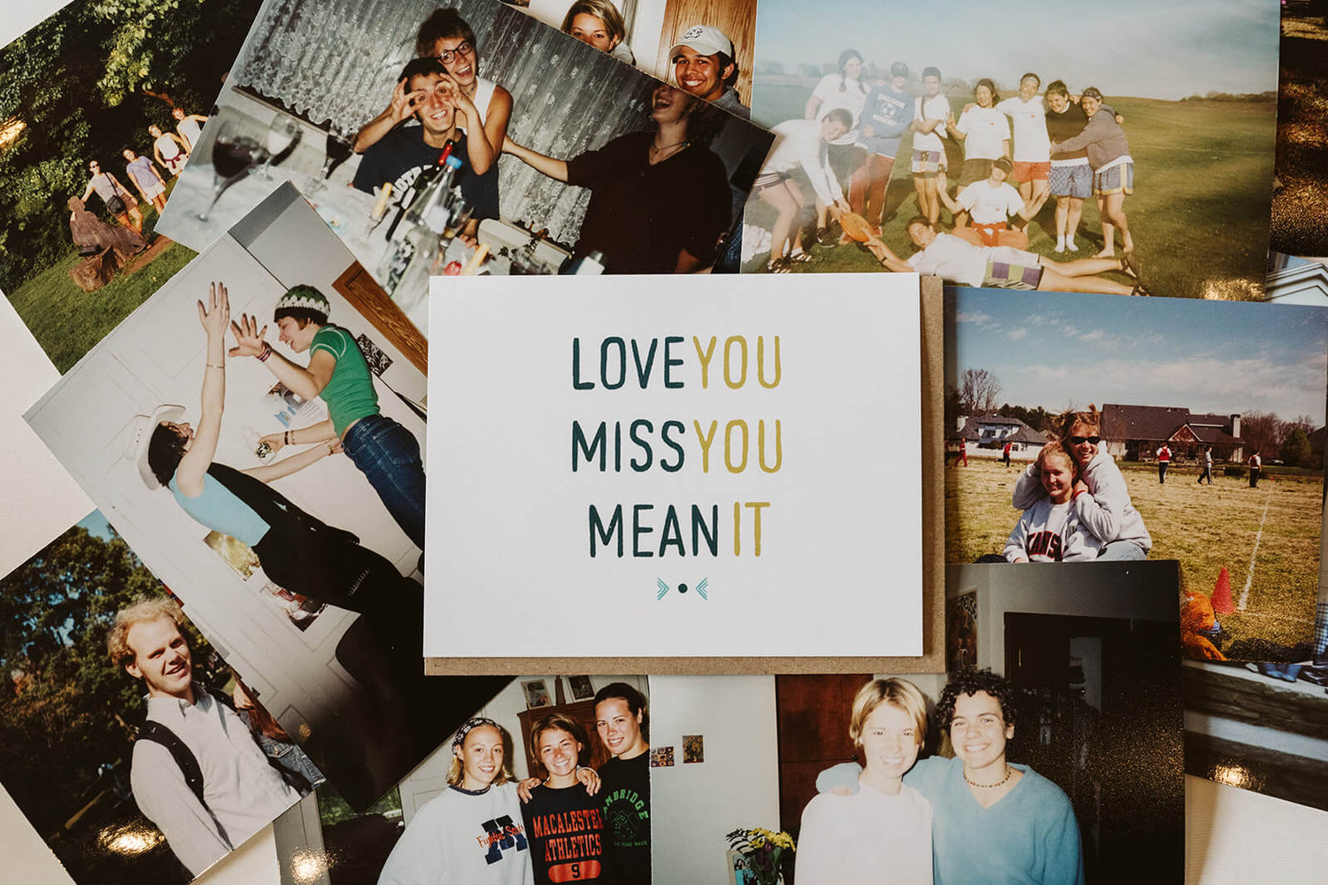 A friendship greeting card with the text "Love You Miss You Mean It." The card is on top of a background of vintage photos.