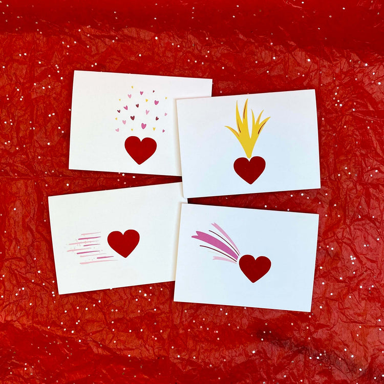 Collection of Valentine cards with a sparkly red heart, each in a different design.