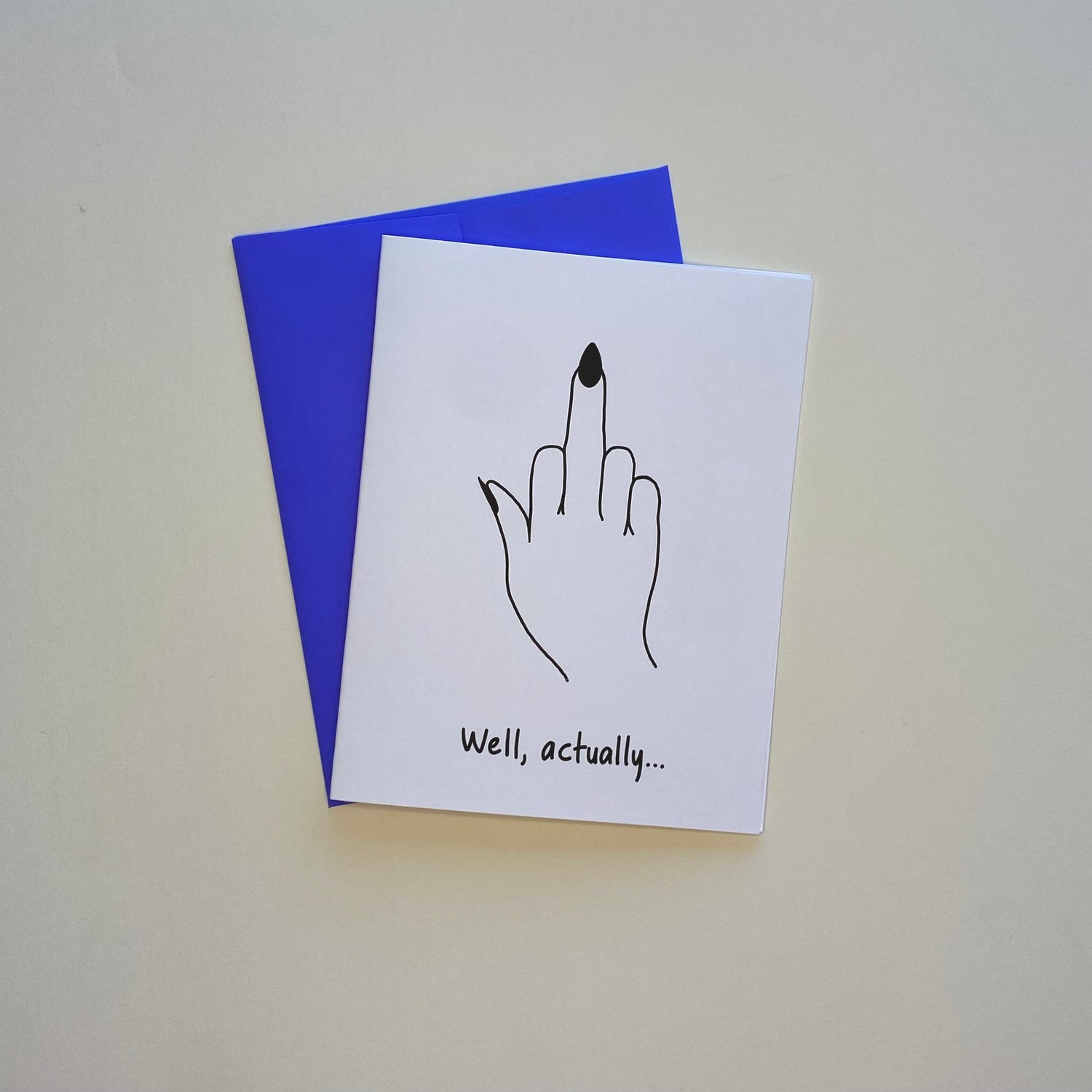 Greeting card showing a hand with the middle finger up and the words, "Well, actually..."