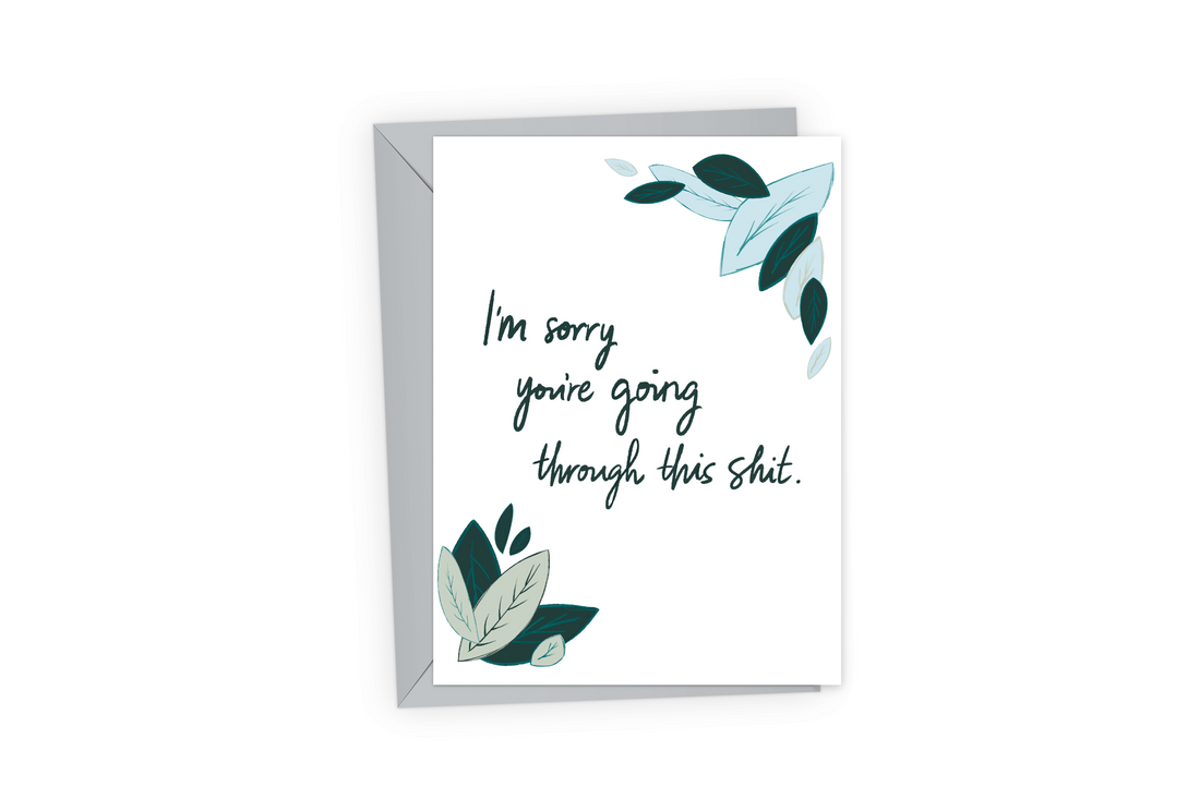 Sympathy card with light blue, dark green, and light green leaves and the text, "I&