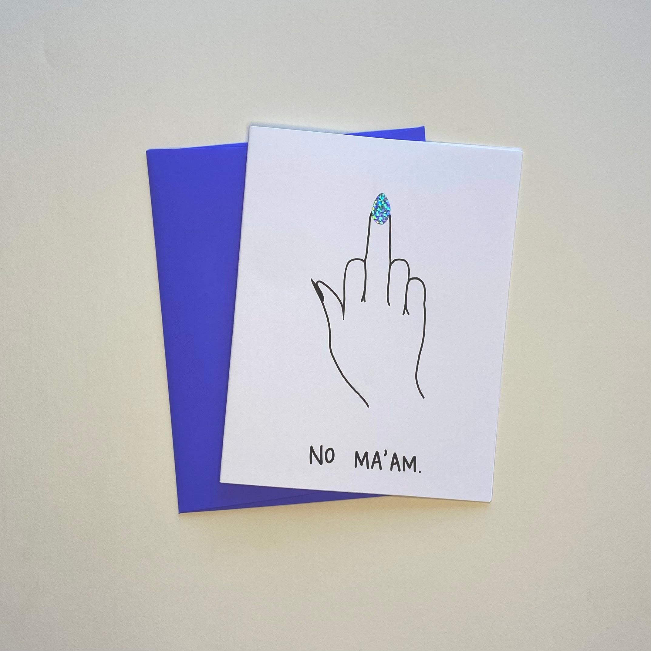 Middle finger greeting card with a pointed, glittery fingernail and the words, &quot;No ma&