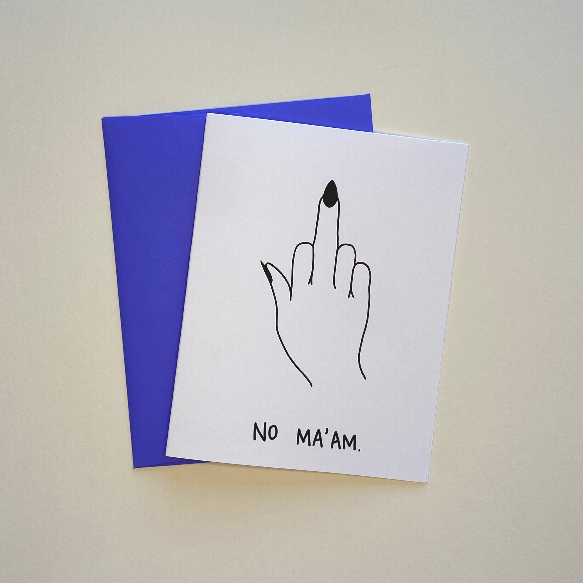 Middle finger greeting card with a black, pointed fingernail and the words, &quot;No ma&