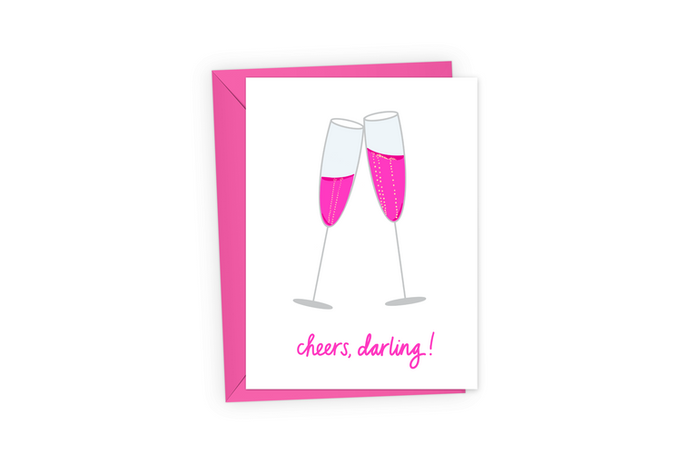 Celebratory greeting card with two clinking glasses of pink champagne and the words, "cheers, darling!"