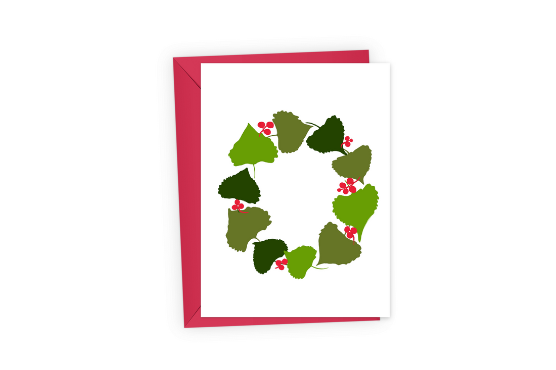 Winter wreath of aspen leaves and red berries