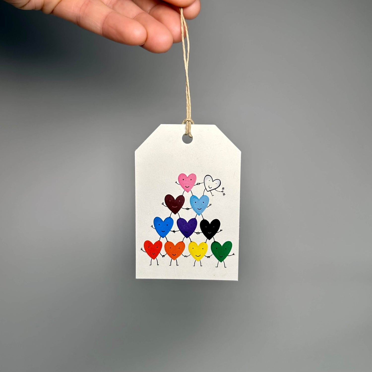 Gift tags with a hemp twine tie and rainbow heart pyramid design