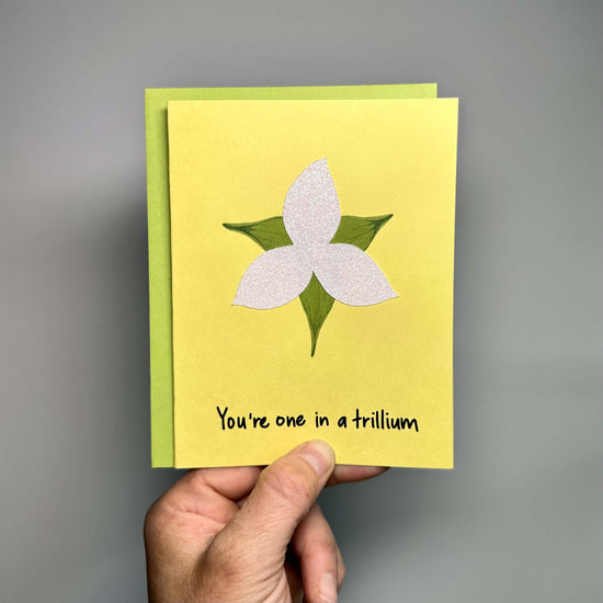 Thank you card on yellow cardstock with a sparkly white trillium and the words, "You&
